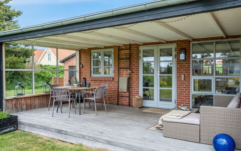 Agni - 800M from the Sea: Furniture, Porch, Outdoor Furniture, Home, Roof, Door, Outdoor Table, Patio, Deck, Cottage
