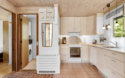 Mirva - 800M to the Fjord: Kitchen, Flooring, Countertop, Kitchen Appliance, Interior Design, Furniture, Wood, Cabinetry, Major Appliance, Floor