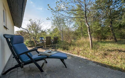 Mirva - 800M to the Fjord: Furniture, Outdoor Furniture, Chair, Sunlight, Shade, Garden, Landscaping, Sunlounger, Backyard, Eco Hotel