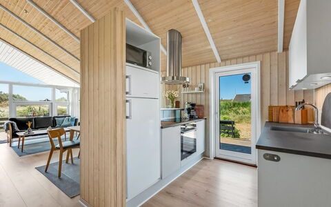 Fejzo - 700M to the Fjord: Furniture, Interior Design, Chair, Flooring, Table, Resort, Floor, Ceiling, Room, Eco Hotel