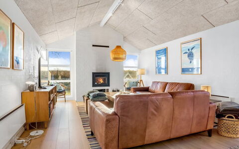 Marjukka - 10M from the Sea: Ceiling, Chair, Living Room, Hardwood, Couch, Wood Stain, Light Fixture, Daylighting, Beam