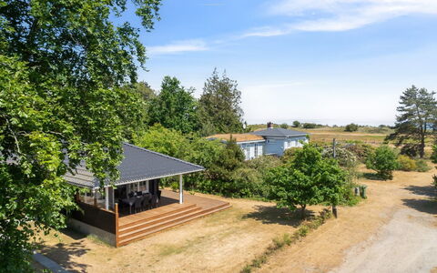 Auke - 100M from the Sea: House, Home, Door, Roof, Cottage, Estate, Garden, Shade, Siding, Yard