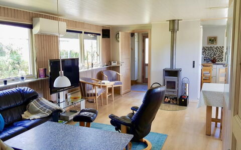 Gudrid - 500M from the Sea: Furniture, Interior Design, Flooring, Wood, Floor, Ceiling, Room, Living Room, Couch, Lighting