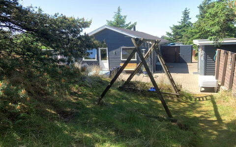 Gudrid - 500M from the Sea: Shrub, Home, Garden, Cottage, Backyard, Shade, Lawn, Yard, Siding, Landscaping