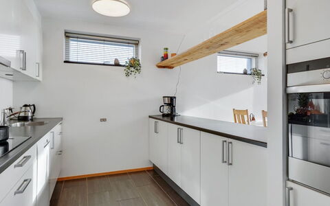 Pirkko - 100M from the Sea: Countertop, Kitchen, Interior Design, Flooring, Cabinetry, Wood, Ceiling, Furniture, Kitchen Appliance, Plumbing Fixture