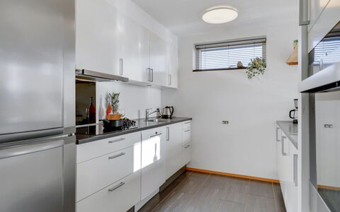 Pirkko - 100M from the Sea: Countertop, Kitchen, Cabinetry, Interior Design, Kitchen Appliance, Flooring, Major Appliance, Furniture, Ceiling, Home Appliance