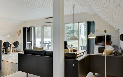Reijo: Furniture, Interior Design, Flooring, Floor, Ceiling, Wood, Couch, Light Fixture, Living Room, Lighting