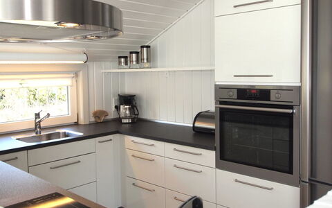 Emmarenze - 400M from the Sea: Kitchen, Countertop, Kitchen Appliance, Interior Design, Cabinetry, Flooring, Wood, Ceiling, Home Appliance, Major Appliance