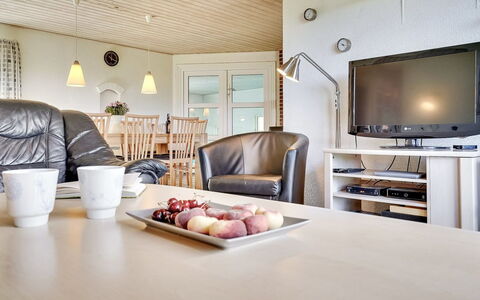 Aurelia - 500M to the Fjord: Furniture, Interior Design, Flooring, Ceiling, Wood, Floor, Couch, Living Room, Light Fixture, Room