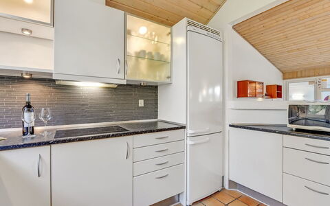 Tali - 700M from the Sea: Kitchen, Countertop, Kitchen Appliance, Flooring, Interior Design, Major Appliance, Wood, Cabinetry, Floor, Ceiling