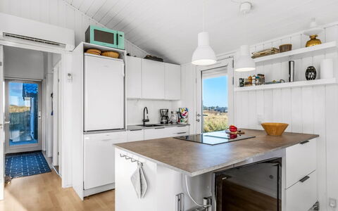 Thorgny - from the Sea: Kitchen, Wood, Countertop, Major Appliance, Kitchen Appliance, Flooring, Interior Design, Ceiling, Floor, Furniture
