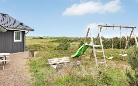 Luzia - 1.2Km from the Sea: House, Roof, Home, Cottage, Shed, Garden Buildings, Siding, Yard, Log Cabin, Hut