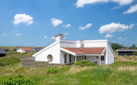 Jænis - from the Sea: Sky, Grass, Building, Roof, Home, House, Architecture, Residential Area, Cottage, Land Lot