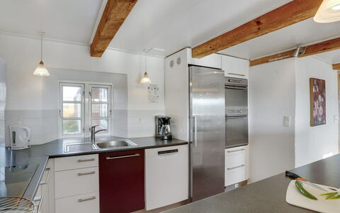Answald - 250M from the Sea: Kitchen, Countertop, Flooring, Wood, Ceiling, Interior Design, Cabinetry, Kitchen Appliance, Kitchen Sink, Floor