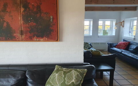 Answald - 250M from the Sea: Furniture, Wall, Interior Design, Flooring, Couch, Floor, Wood, Living Room, Room, Lighting