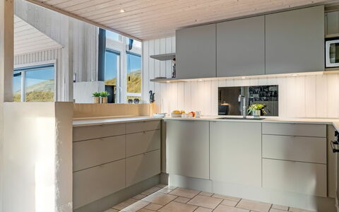 Ludviga - 400M from the Sea: Kitchen, Countertop, Kitchen Appliance, Flooring, Interior Design, Cabinetry, Furniture, Wood, Floor, Major Appliance
