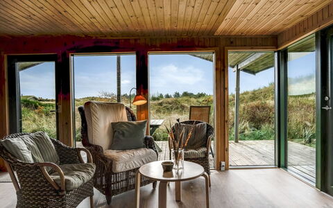 Hunved - 500M from the Sea: Wood, Cottage, Hardwood, Garden Buildings, Eco Hotel, Chair, Porch, Wood Stain, Log Cabin, Plank