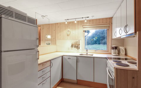Liisi - 500M from the Sea: Kitchen, Countertop, Kitchen Appliance, Flooring, Interior Design, Wood, Major Appliance, Cabinetry, Ceiling, Furniture