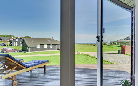 Alexis - 250M from the Sea: Door, Porch, Cottage, Shade, Home Door, Deck, Estate, Siding, Hardwood, Chair