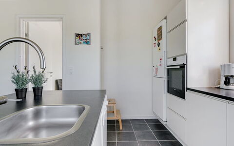 Hathulf - 700M from the Sea: Kitchen, Countertop, Kitchen Appliance, Flooring, Interior Design, Major Appliance, Cabinetry, Floor, Kitchen Sink, Plumbing Fixture