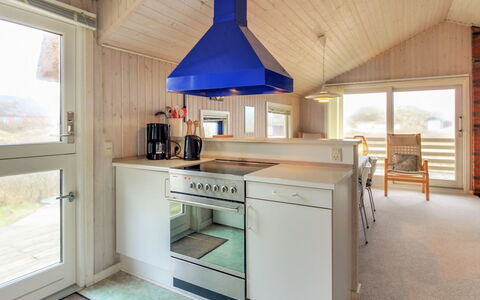 Telia - 250M from the Sea: Wood, Ceiling, Kitchen, Interior Design, Flooring, Light Fixture, Furniture, Room, Floor, Countertop