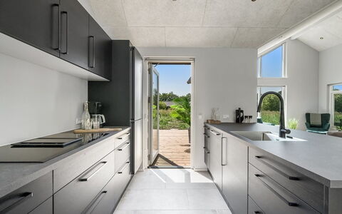 Måns - 500M to the Fjord: Kitchen, Countertop, Flooring, Kitchen Appliance, Interior Design, Furniture, Cabinetry, Floor, Major Appliance, Home Appliance
