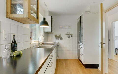 Flor - 900M from the Sea: Kitchen, Countertop, Flooring, Interior Design, Wood, Cabinetry, Ceiling, Light Fixture, Floor, Furniture