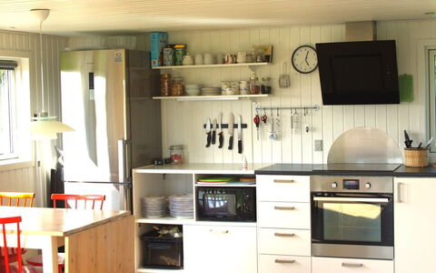 Carelle - 300M from the Sea: Kitchen, Kitchen Appliance, Furniture, Countertop, Major Appliance, Flooring, Wood, Interior Design, Cabinetry, Home Appliance