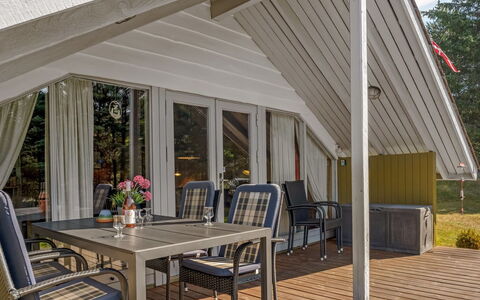Maritha - 950M from the Sea: Wood, Shade, Chair, Porch, Hardwood, Ceiling, Cottage, Deck, Outdoor Furniture, Plank