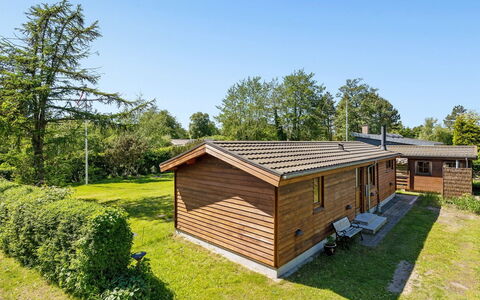 Agda - 100M from the Sea: Grass, House, Shrub, Home, Cottage, Roof, Land Lot, Lawn, Garden, Estate