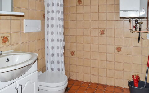 Urmas - 1Km from the Sea: Bathroom, Plumbing Fixture, Flooring, Floor, Bathroom Sink, Interior Design, Sink, Tap, Toilet Seat, Toilet