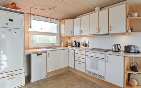 Gudni - 250M from the Sea: Kitchen, Countertop, Wood, Kitchen Appliance, Interior Design, Flooring, Major Appliance, Ceiling, Cabinetry, Furniture