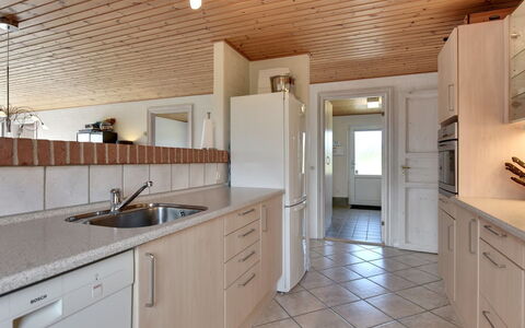 Dorothea - 450M to the Fjord: Countertop, Flooring, Kitchen, Interior Design, Furniture, Floor, Cabinetry, Wood, Ceiling, Light Fixture