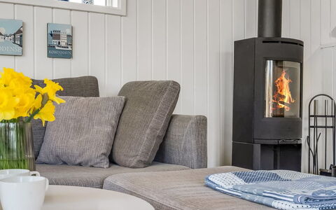 Bylgja - 1.7Km from the Sea: Furniture, Flooring, Interior Design, Floor, Wood, Living Room, Wood Flooring, Couch, Table, Home