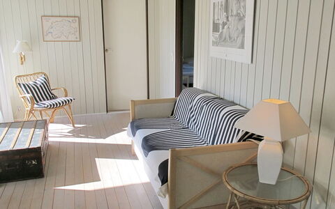 Claudette - 1Km from the Sea: Furniture, Interior Design, Wood, Flooring, Floor, Room, Home, Living Room, Chair, Picture Frame