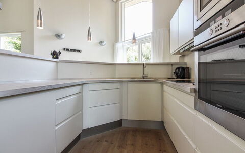 Elicia - 950M from the Sea: Flooring, Interior Design, Kitchen, Countertop, Cabinetry, Floor, Wood, Ceiling, Kitchen Appliance, Furniture
