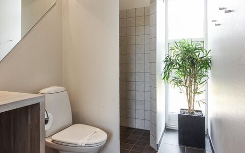 Elicia - 950M from the Sea: Flooring, Wall, Floor, Toilet Seat, Toilet, Plumbing Fixture, Interior Design, Bathroom, Tile, Composite Material