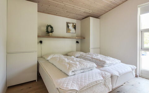 Elicia - 950M from the Sea: Bed, Furniture, Bedroom, Interior Design, Flooring, Floor, Wall, Wood, Ceiling, Bed Sheet