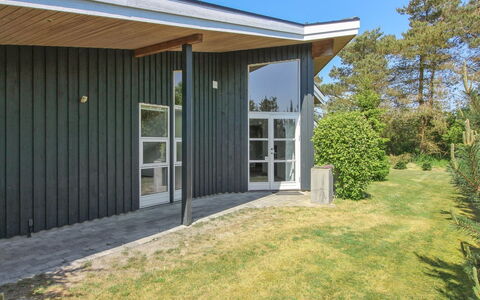 Elicia - 950M from the Sea: Home, Door, Shade, Siding, Lawn, Garden, Backyard, Hardwood, Yard, Garden Buildings