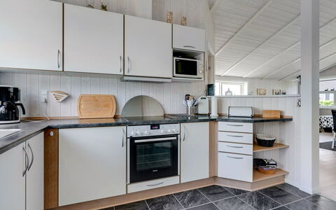Gustava - 700M from the Sea: Kitchen, Flooring, Wood, Countertop, Interior Design, Floor, Ceiling, Major Appliance, Kitchen Appliance, Cabinetry