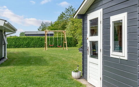 Gustava - 700M from the Sea: Wood, Siding, Door, Home, Garden, Garden Buildings, Cottage, Lawn, Backyard, Yard