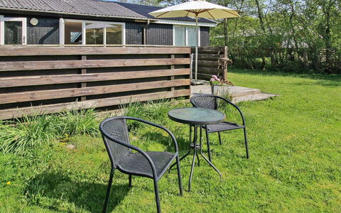 Nielsine - 1.5Km from the Sea: Cottage, Backyard, Garden, Lawn, Shade, Outdoor Furniture, Outdoor Table, Yard, Chair, Siding