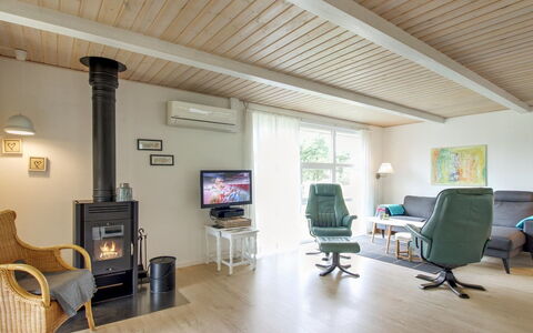 Livia - 900M from the Sea: Furniture, Interior Design, Flooring, Floor, Wood, Wood Flooring, Ceiling, Chair, Living Room, Lighting