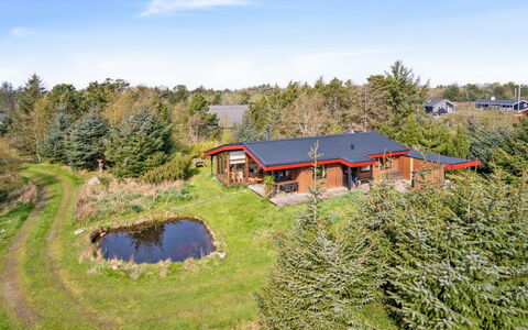 Sune - 500M from the Sea: Roof, House, Home, Cottage, Siding, Estate, Driveway, Garden Buildings, Yard, Shed