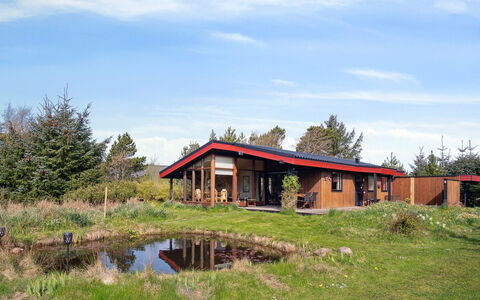Sune - 500M from the Sea: Roof, House, Home, Cottage, Siding, Estate, Driveway, Garden Buildings, Yard, Shed