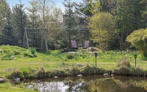 Sune - 500M from the Sea: Roof, House, Home, Cottage, Siding, Estate, Driveway, Garden Buildings, Yard, Shed