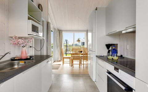 Mara - from the Sea: Kitchen, Flooring, Interior Design, Countertop, Wood, Floor, Furniture, Kitchen Appliance, Ceiling, Major Appliance