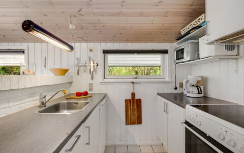 Estelle - 575M to the Fjord: Wood, Kitchen, Flooring, Countertop, Ceiling, Interior Design, Floor, Plumbing Fixture, Lighting, Kitchen Appliance