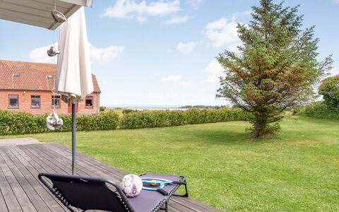 Tanna - 330M to the Fjord: Grass, Furniture, Outdoor Furniture, Land Lot, Garden, Lawn, Outdoor Table, Shade, Chair, Landscaping