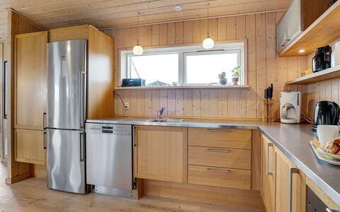 Josten - 500M from the Sea: Kitchen, Kitchen Appliance, Countertop, Flooring, Interior Design, Major Appliance, Cabinetry, Wood, Furniture, Floor